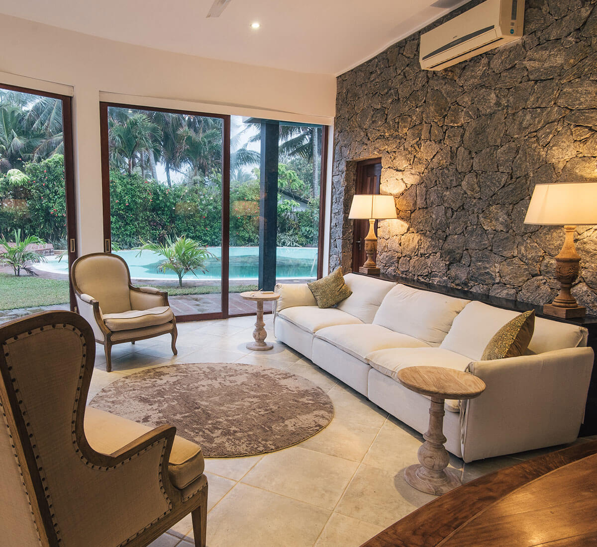 living room with poolside view