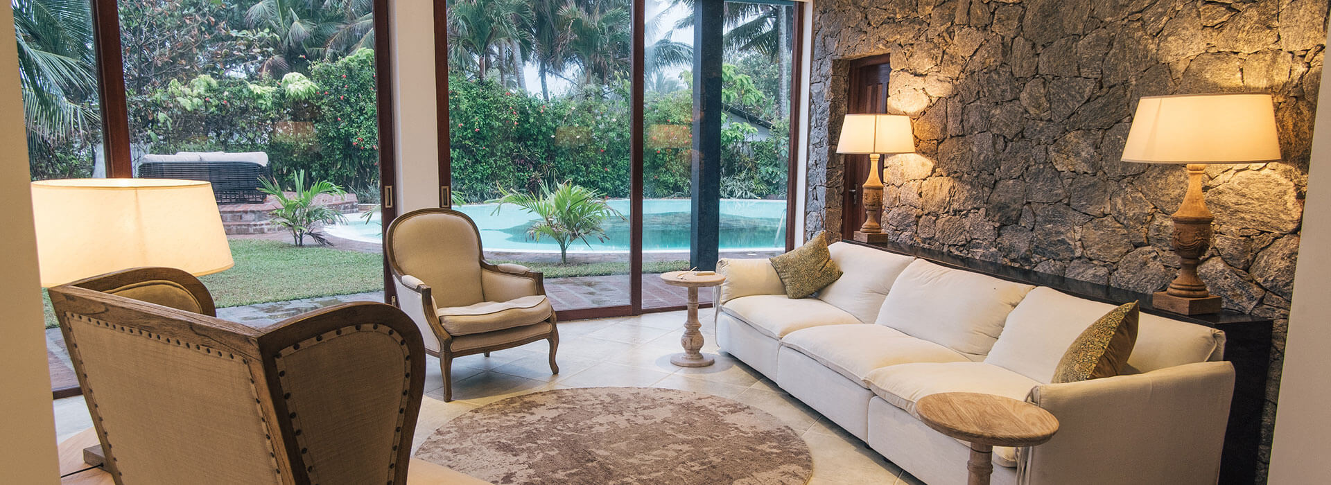 living room with poolside view